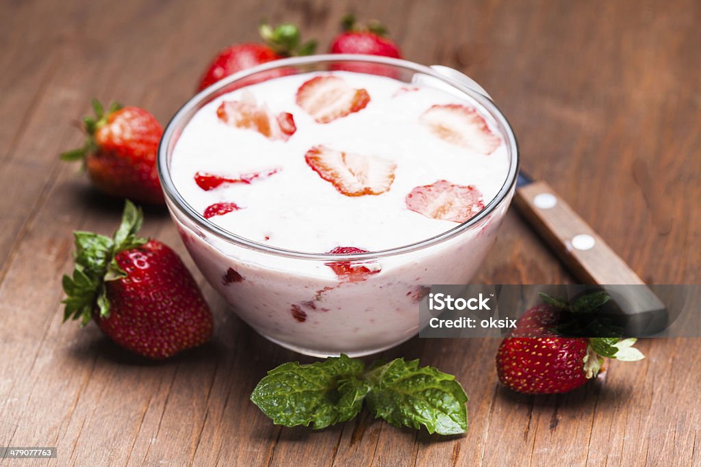 Strawberry yoghurt Strawberry yoghurt in a bowl on the  table Close-up Stock Photo