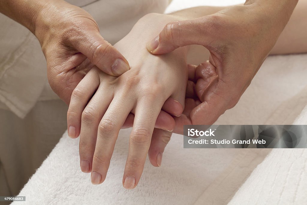 reflexology on hands for relaxation shiatsu massage on hands for arthrosis Shiatsu Stock Photo