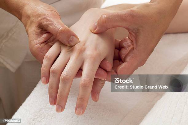 Reflexology On Hands For Relaxation Stock Photo - Download Image Now - Shiatsu, Reflexology, Massaging