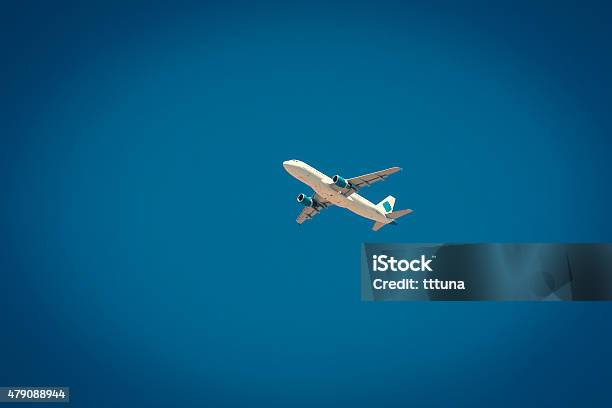 Airplane On Air Traffic Human Transportation Vehicle Stock Photo - Download Image Now
