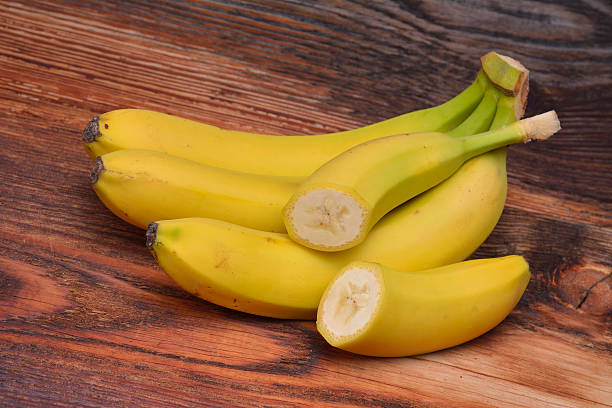istock Bananas on wooden background 479090038