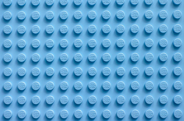 Lego blue baseplate Tambov, Russian Federation - February 20, 2015: Lego blue baseplate. Studio shot. lego stock pictures, royalty-free photos & images