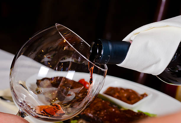 istock Pouring Red Wine into Glass 479091968