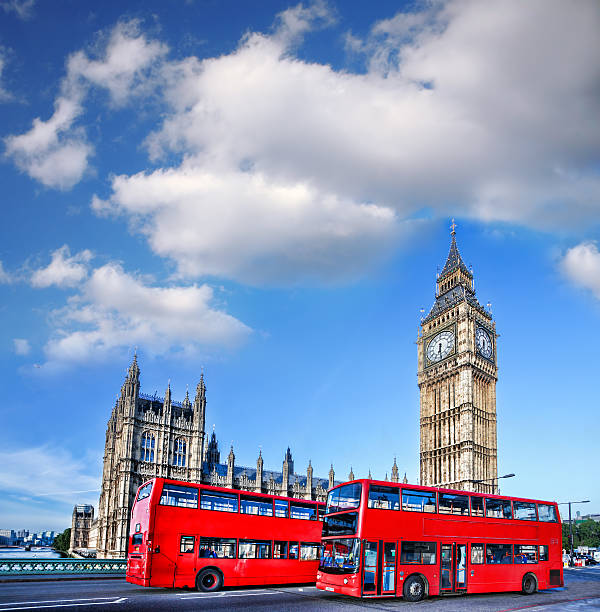 istock Big Ben with red buses in  London, England 479092320