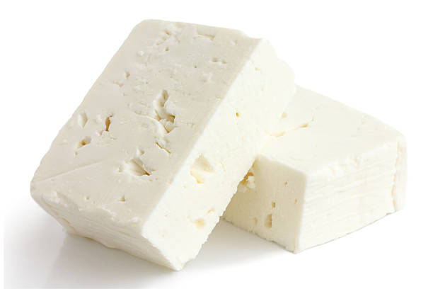 grego queijo feta quarteirão isolado no branco. - queijo feta - fotografias e filmes do acervo