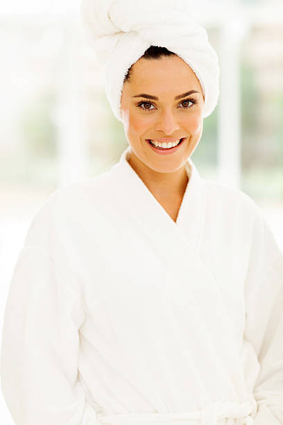 istock pretty woman in white bathrobe 479096605