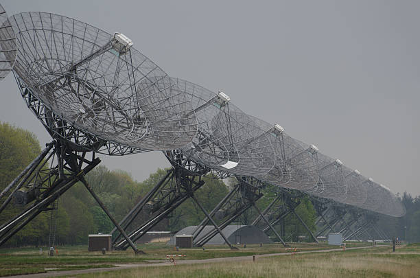 istock Satellite technology receivers in misty landscape 479096654