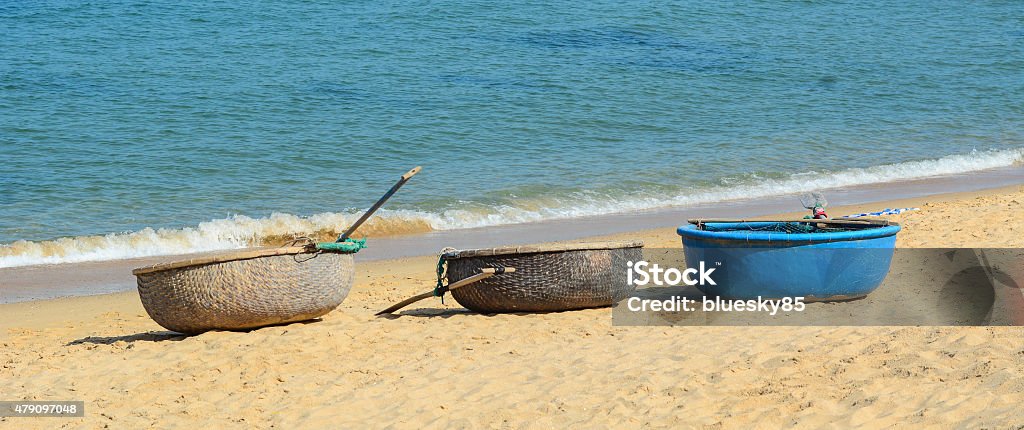 Wooden basket boats on South China Sea Wooden basket boats on South China Sea, Nha Trang bay, Vietnam. 2015 Stock Photo