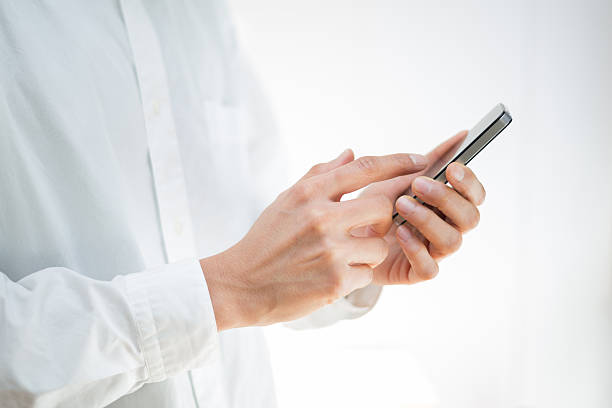 istock Hands of senior men with smartphone 479108454