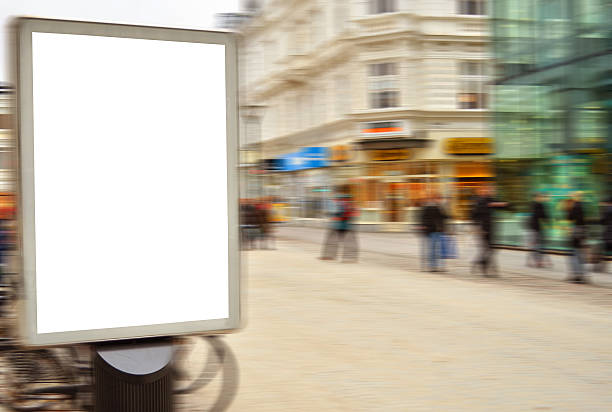 cartellone pubblicitario strada vuota in motion blur - electronic billboard billboard sign arranging foto e immagini stock
