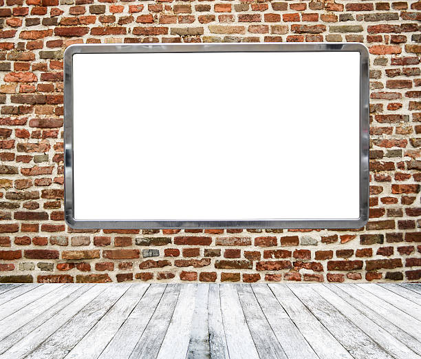 istock Gallery room with empty billboard hanging on brickwall 479110067