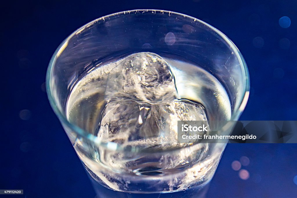 Glass on the rocks Liquor and water soda on the rocks. 2015 Stock Photo