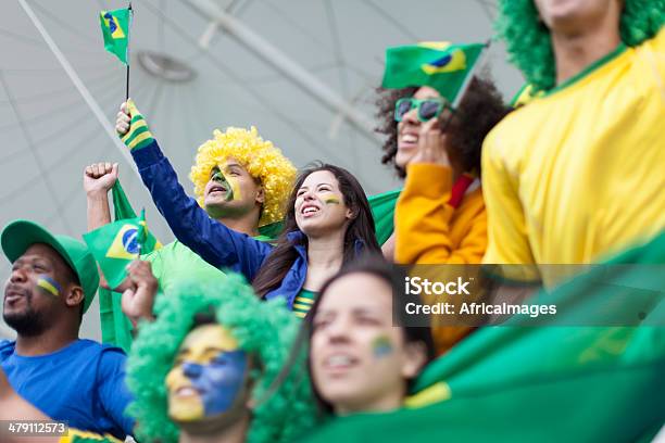 Brazilian Football Fans Cheering Stock Photo - Download Image Now - 2014, Adolescence, Arms Outstretched