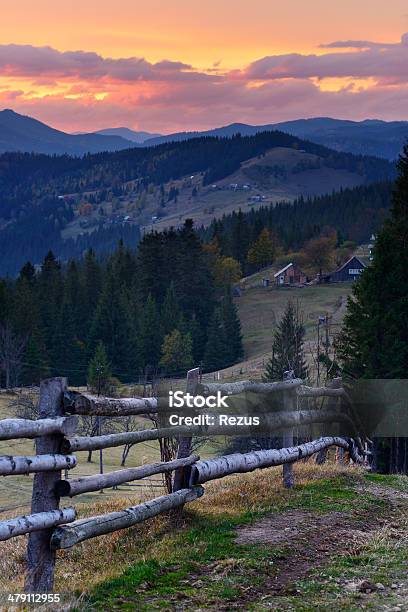 Sunset Rural Landscape In Mountain Village With Dramatic Sky Stock Photo - Download Image Now