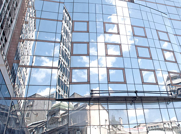 istock sky line reflection in modern glass bulding 479121100