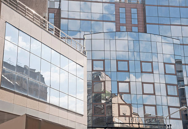 istock sky line reflection in modern glass bulding 479121104