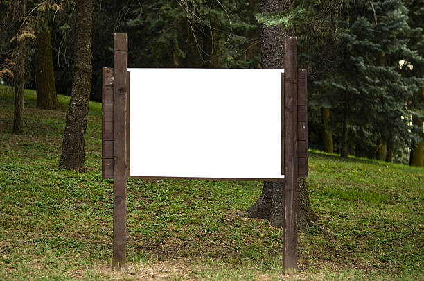 istock Blank wooden billboard in park 479121225
