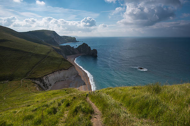 istock White cliffs in Jurassic Coast beach in Dorset, UK 479129418
