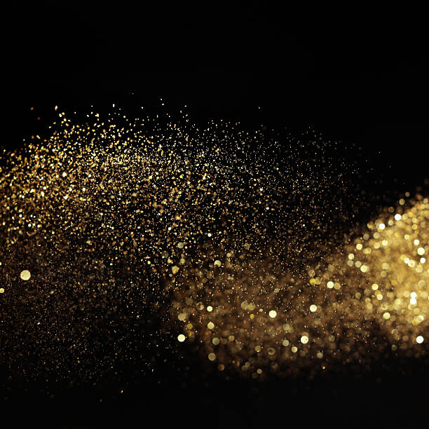 istock Golden glittery light on black background 479129779