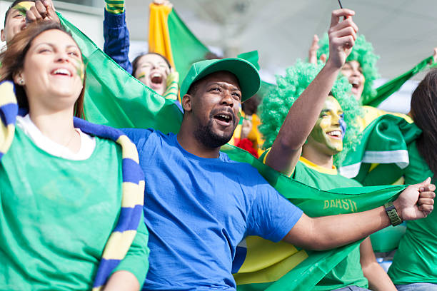 istock Brazilian fans supporting with passion! 479129915