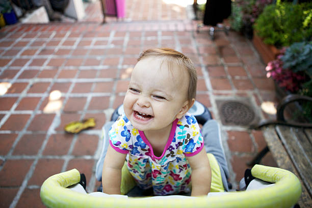 cute bebê menina com um sorriso aberto - offspring child toothy smile beautiful imagens e fotografias de stock