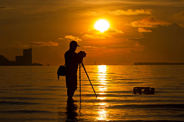 istock silhouette of  photographer 479133861
