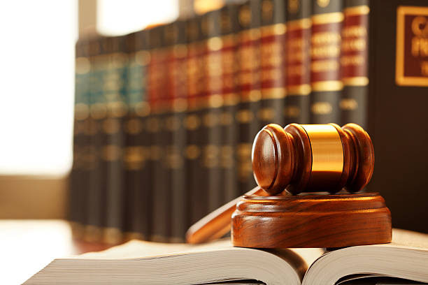 istock Gavel Resting On Top Of Open Law Book 479134690