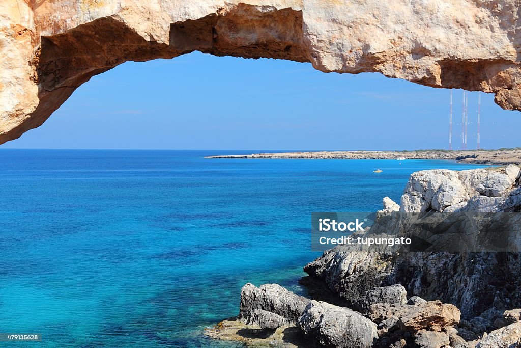 Cyprus nature Cyprus - Mediterranean Sea coast. Natural rock bridge at Cape Greco near Ayia Napa. 2015 Stock Photo