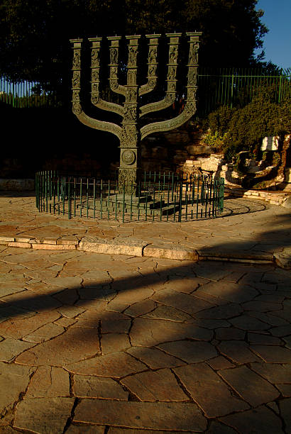 istock the menorah statue by the knesset, jerusalem, israel 479136169