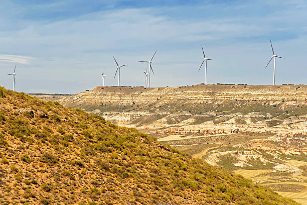 istock Wind turbines on the hill in front of blue sky 479142280