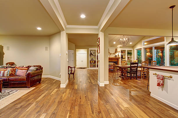 Cozy family dinning room, and ktchen. Cozy family room, dinning room, and kitchen with decor. hardwood floor stock pictures, royalty-free photos & images
