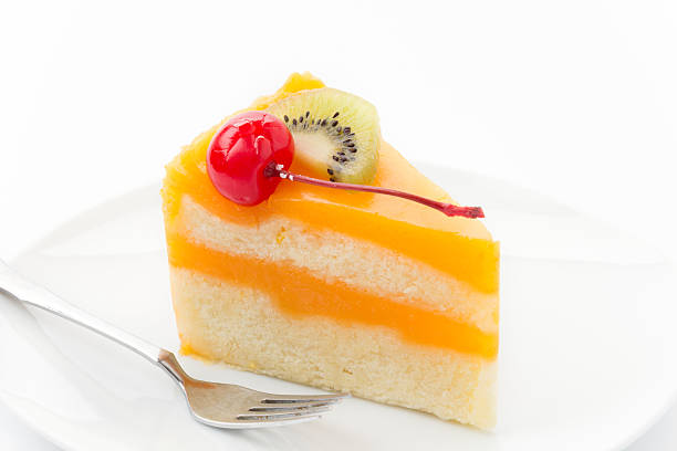 istock orange cake with kiwi and cherry 479155122