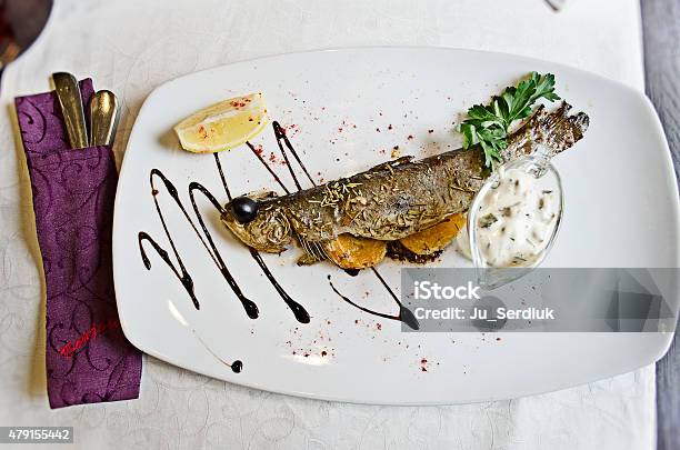 Grilled Fish In A French Restaurant Stock Photo - Download Image Now - 2015, Appetizer, Cooked