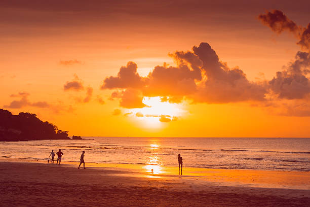 sunset on the beach - indonesia football stok fotoğraflar ve resimler