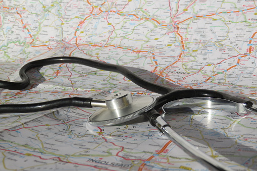 Stethoscope and map