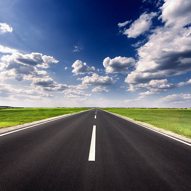 istock Driving on empty asphalt road at idyllic sunny day 479157850