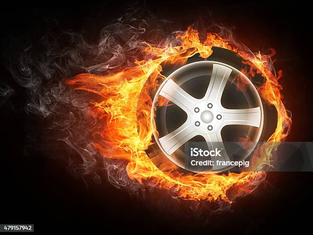 Car Wheel In Flame Stock Photo - Download Image Now - 2015, Burning, Burnt