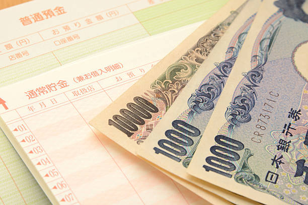 management für haushalt budget - japanischer yenschein stock-fotos und bilder