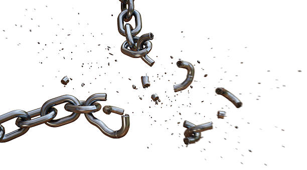 Broken Chain A15 This is a dramatic shot of a chain falling apart under a severe blow of an invisible force. The chain links at the point of impact are shattered outwards in a diagonal direction. The scene is isolated on a pure white background. chain object photos stock pictures, royalty-free photos & images
