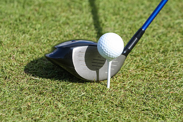 istock Golf ball and club in grass 479158325