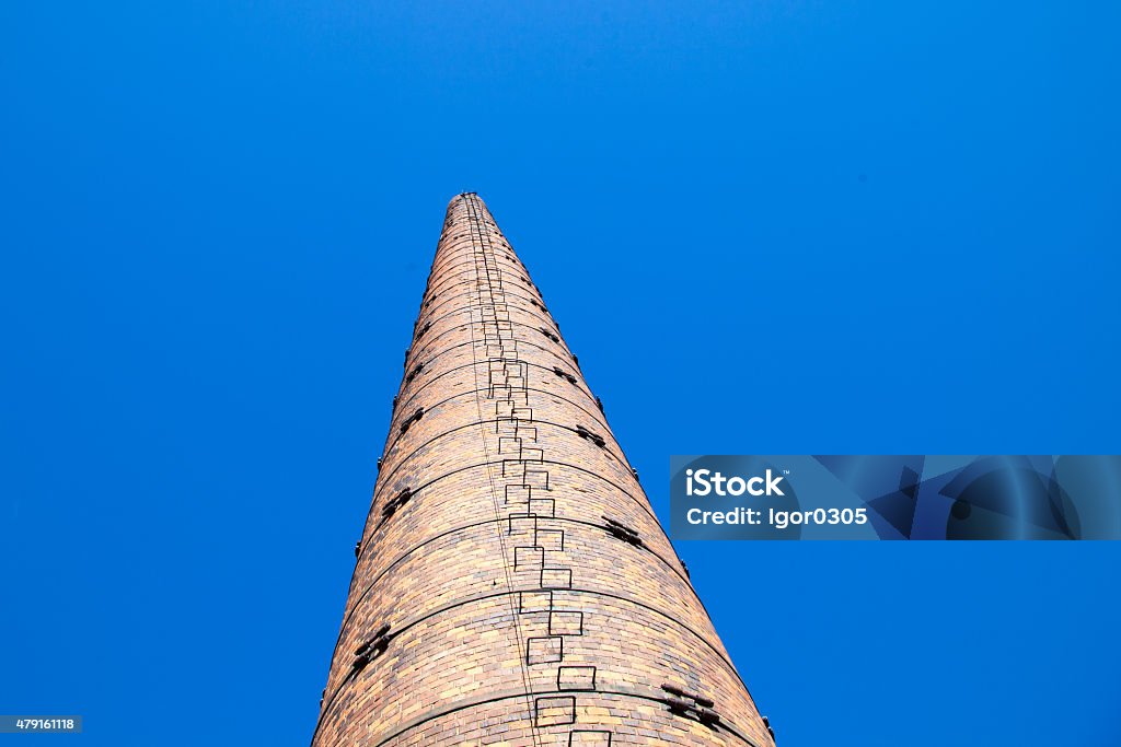 Old chimney Old industrial chimney made from the red bricks 2015 Stock Photo