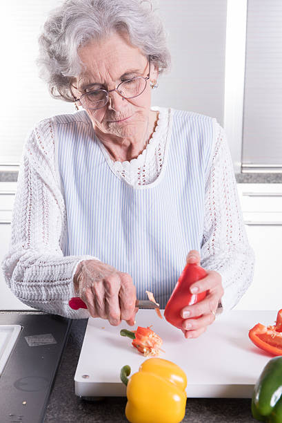istock active female senior preparing paprika 479161242