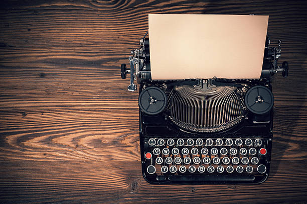 istock Retro typewriter on wooden planks 479162560