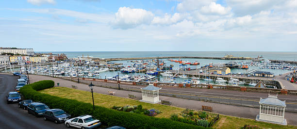 Ramsgate Harbour Panorama A panorama of Ramsgate Harbour and town. A popular destination in Kent, UK. Logos, signs and people removed. ramsgate stock pictures, royalty-free photos & images