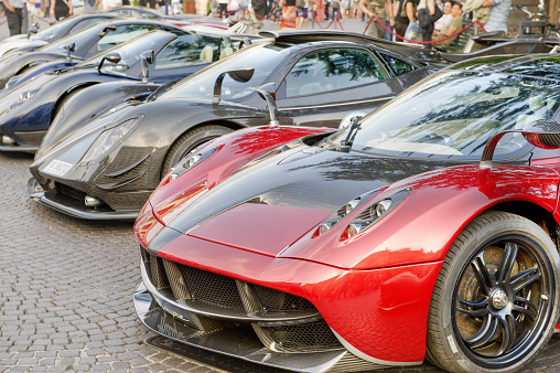 Verona, Italy - June, 21 2014: Pagani Huayra in a lineup of other Pagani supercars. Part of a display of Pagani, Lamborghini, Mercedes and Ford Supercars in Piazza Bra.