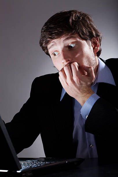 istock Man terrified looking at his laptop 479171785
