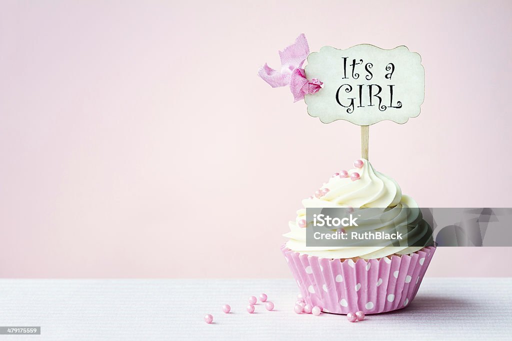 Baby shower cupcake Baby shower cupcake with copy space to side It's A Girl Stock Photo
