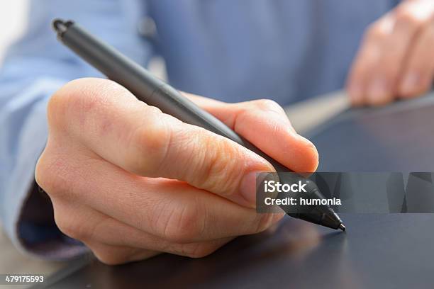 Hands Holding Graphic Tablet Pen Stock Photo - Download Image Now - Digitized Pen, Artist, Backgrounds