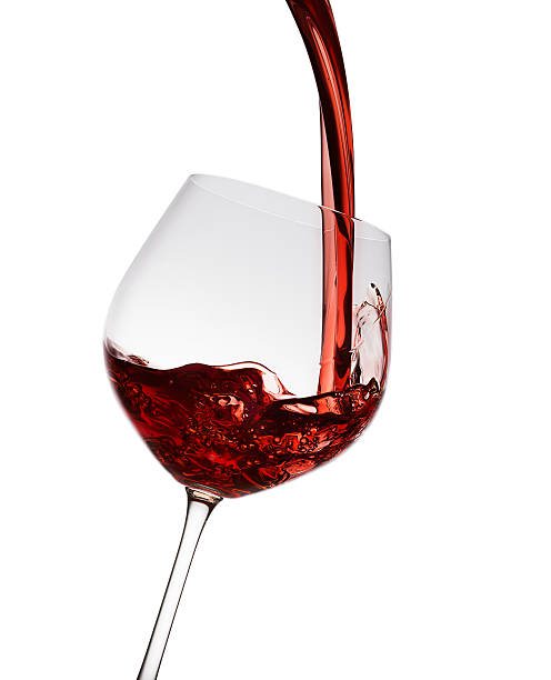 istock Red wine poured in a glass 479181892