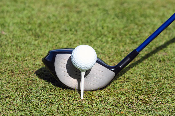 istock Golf ball and club in grass 479184689